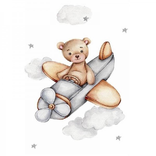 Teddybeer in vliegtuig